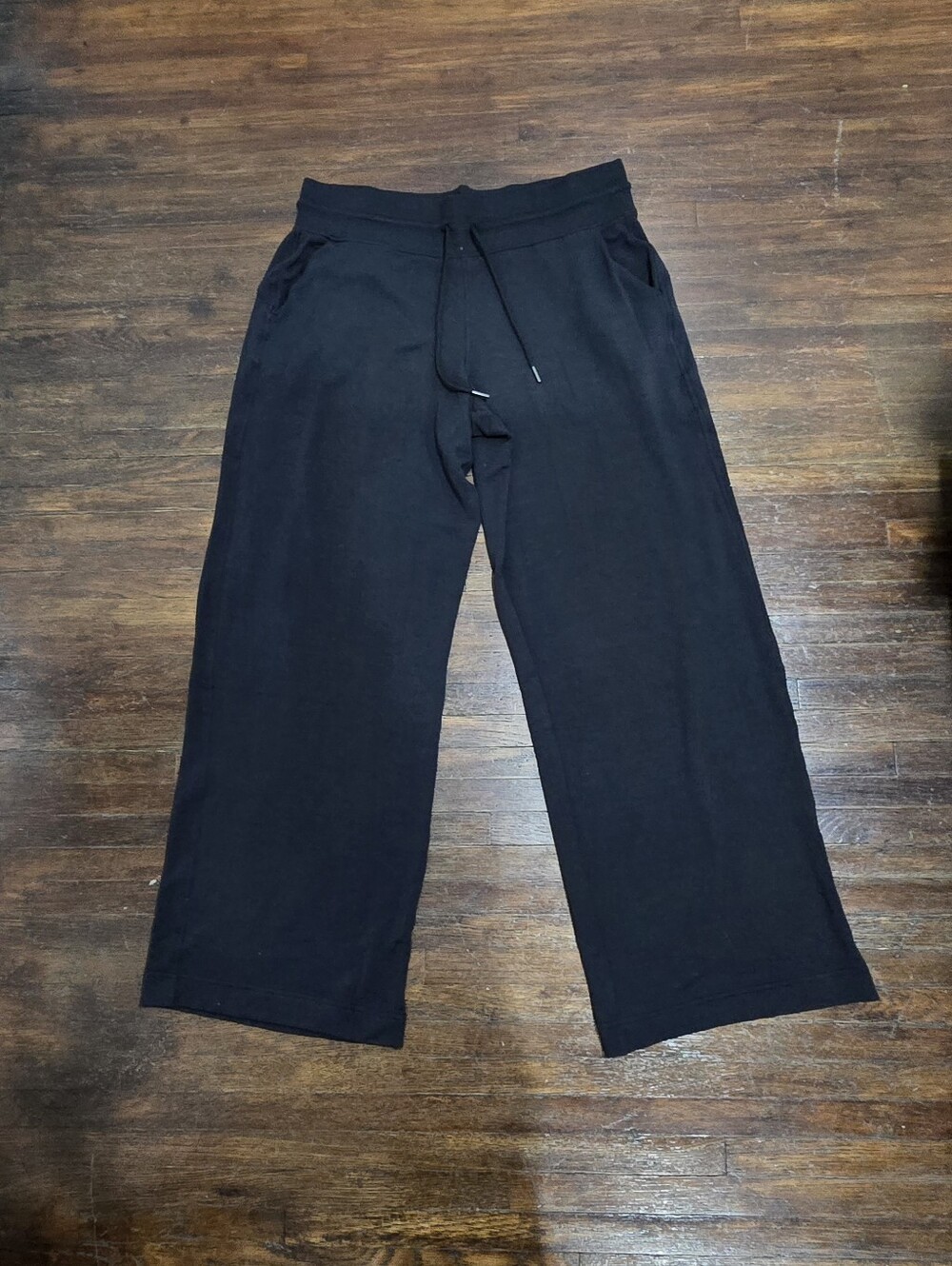 Athleta black wide-leg drawstring pants.